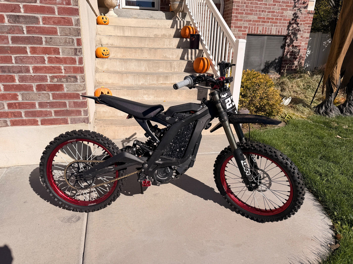 2022 Surron Light Bee with red rims and black hubs, photo 1 of 5