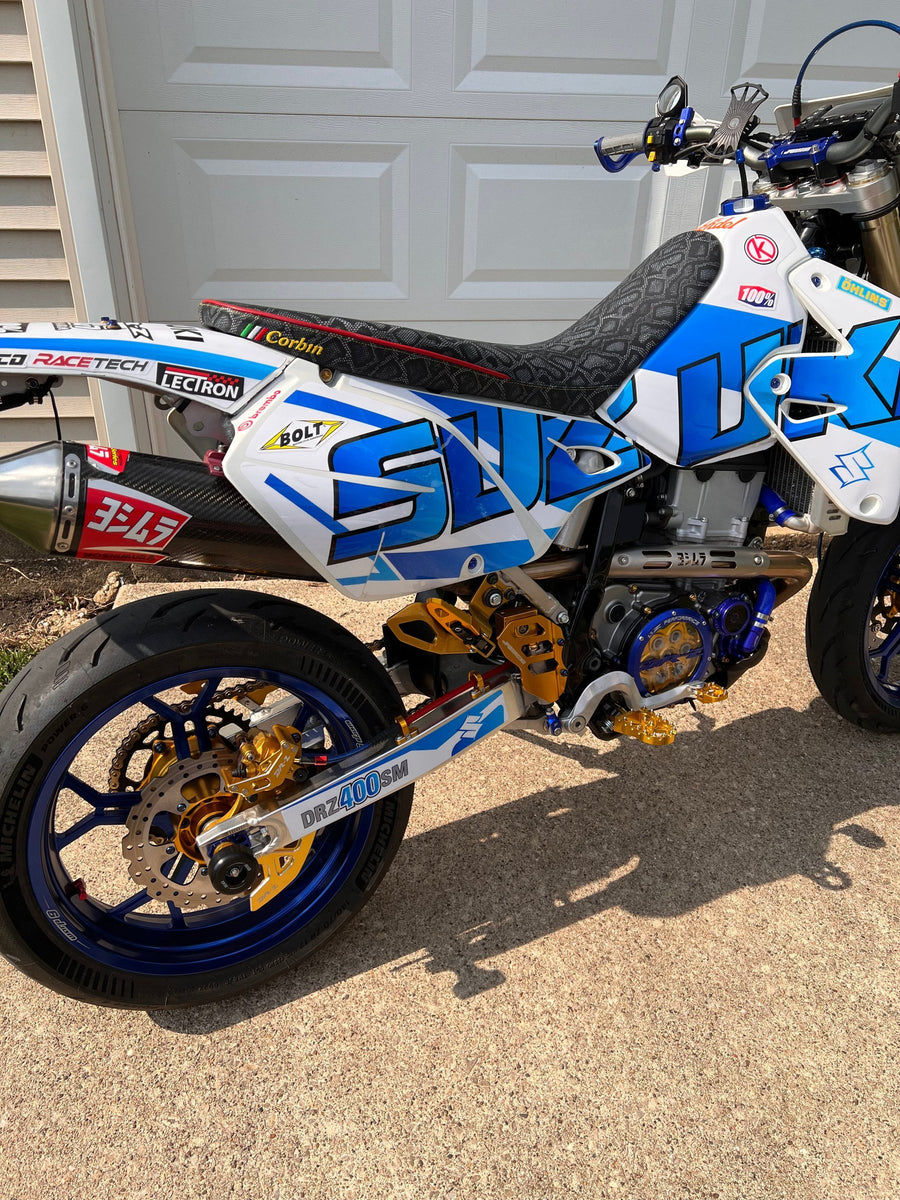 Suzuki DR-Z400SM, Blue rims · Gold hubs