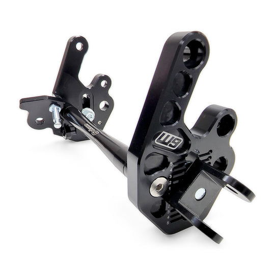 Warp 9 adjustable foot peg mount: black billet brackets with numbered adjustment teeth, chromoly peg brackets and cross brace