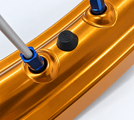 Rim hole plug