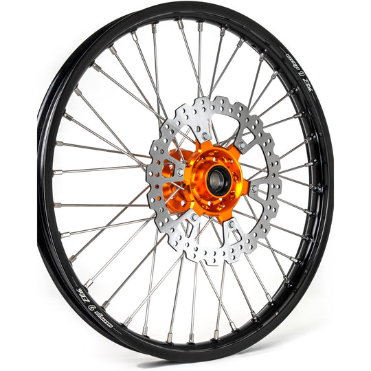 Warp 9 21-inch front wheel with an orange hub, black rim, silver spokes and a 260mm rotor