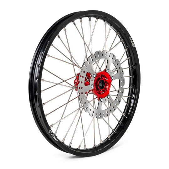 Warp 9 21-inch front wheel with a red hub, black rim, silver spokes and a drilled brake rotor