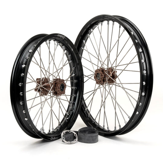 Warp 9 19-inch front and 16-inch rear e-moto wheels with black rims, magnesium hubs and silver spokes