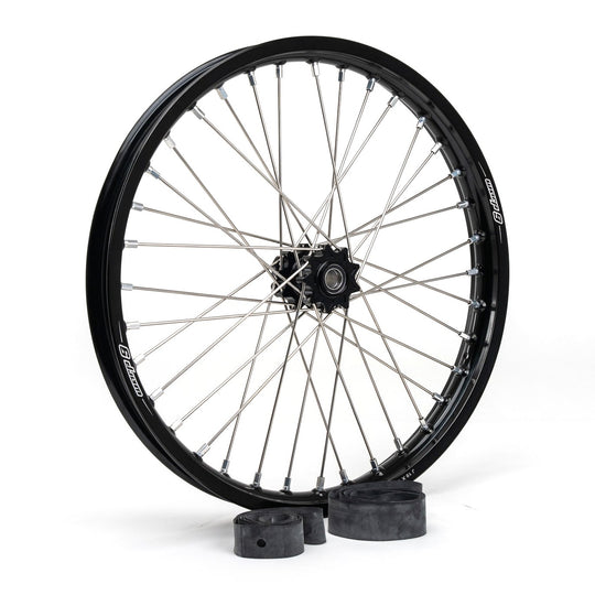 Warp 9 19-inch e-moto front wheel with a black rim, black hub and silver spokes, with two black wheel spacers