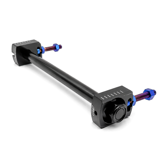 Warp 9 E-Ride Pro rear axle kit: black axle with two black axle blocks and blue titanium adjuster bolts
