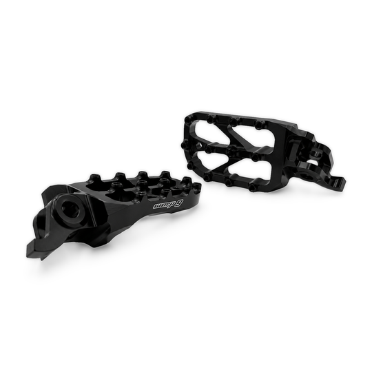 Warp 9 Elite forged aluminum foot pegs in black with stainless traction screws