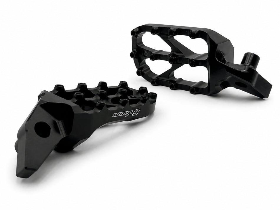 Warp 9 Ducati Desmo Elite foot pegs in black anodized forged aluminum with stainless traction screws