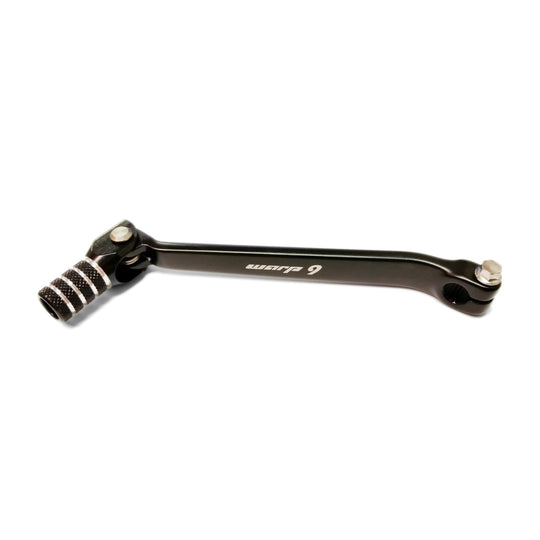 Warp 9 gear shifter with a black cast arm and knurled folding aluminum tip