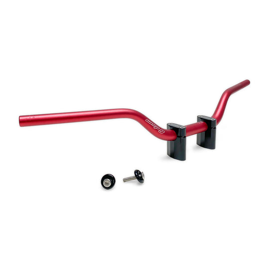 Warp 9 MX tapped handlebar in red anodized aluminum on black bar mounts, with two black grip guard bar ends and bolts