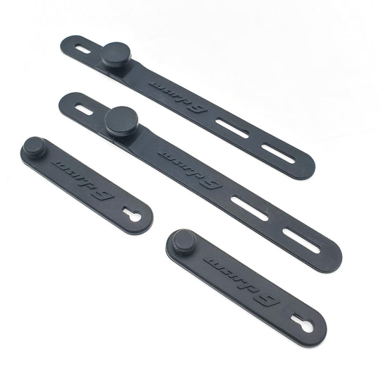 Four Warp 9 rubber handlebar straps in black, two standard and two adjustable