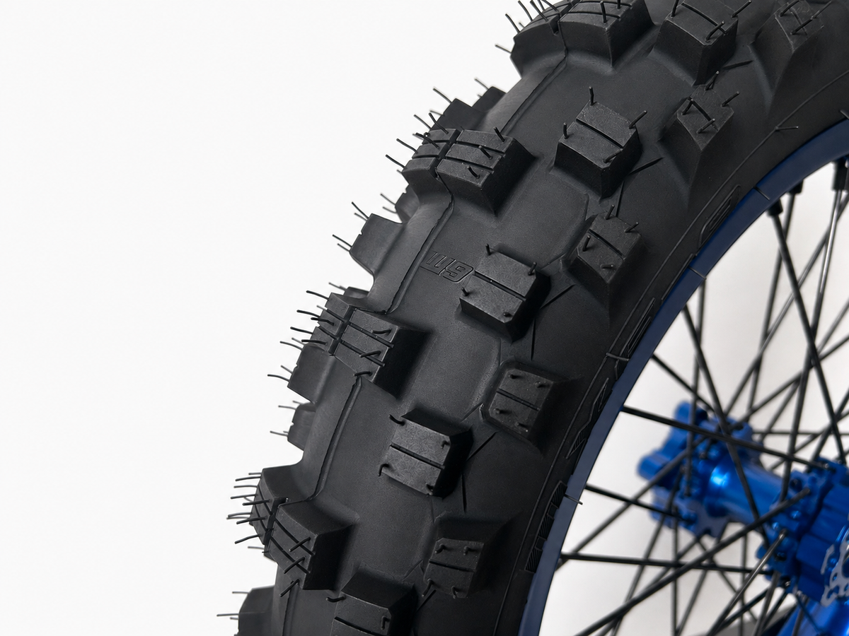 Warp 9 MXE-9 90/100-16 rear tire, close-up of the lugs