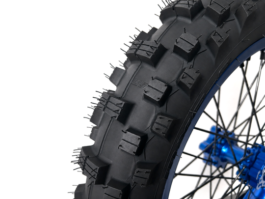 Warp 9 MXE-9 90/100-16 rear tire, close-up of the lugs