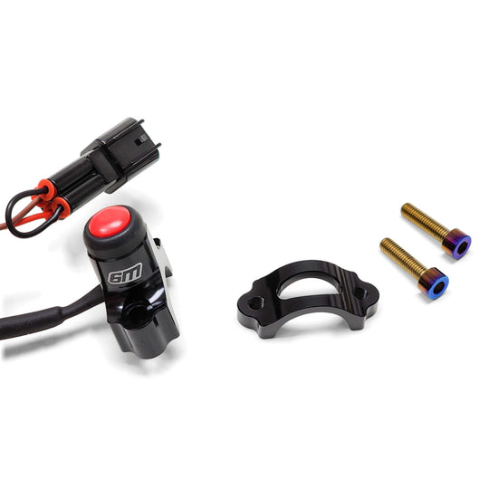 Warp 9 Surron horn button V2: red push button in a black housing with plug-in harness, back half clamp and two burnt titanium screws