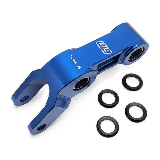 Warp 9 Light Bee rear linkage riser in blue anodized aluminum, 0.75 inch size, with four rubber bearing seals