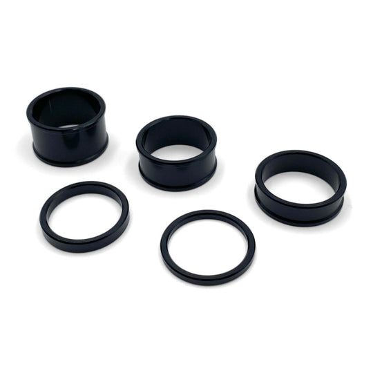 Warp 9 stem lock spacer kit, five black spacers in different heights