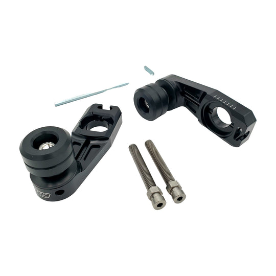 Warp 9 Ultra Bee rear slider set: black anodized axle blocks with black UHMW spools, two stainless adjuster bolts and a long Allen wrench