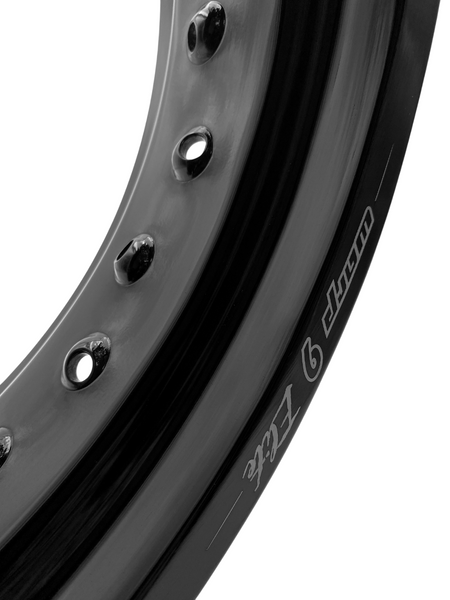 Warp 9 supermoto rim in black anodized aluminum