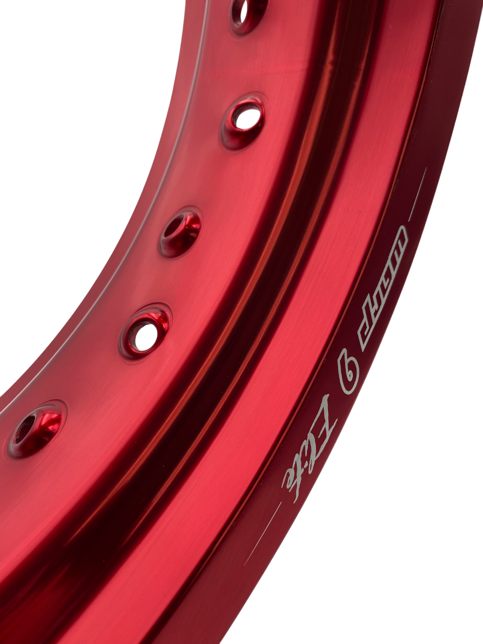 Warp 9 supermoto rim in red anodized aluminum