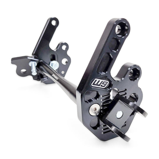 Warp 9 Talaria adjustable foot peg mount: black aluminum brackets with adjustment holes, chromoly peg brackets and cross brace
