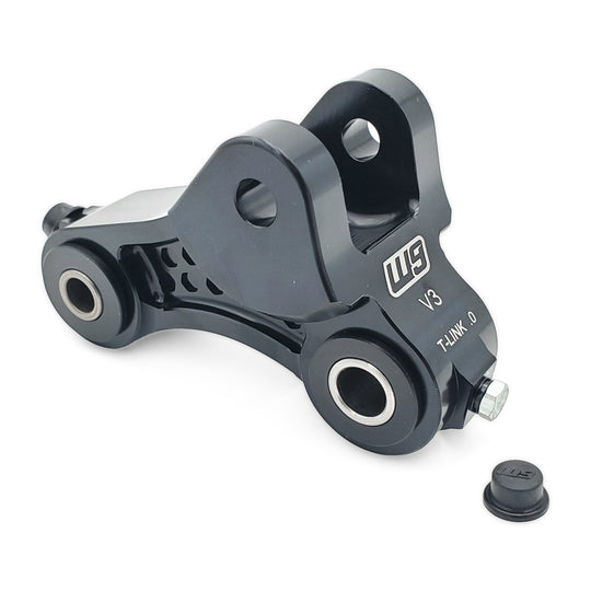 Warp 9 Talaria Sting rear linkage in black anodized aluminum with bearings and a grease port cap