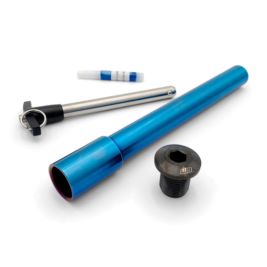Warp 9 Stark Varg titanium front axle in burnt blue with its T-handle puller, nut and thread locker