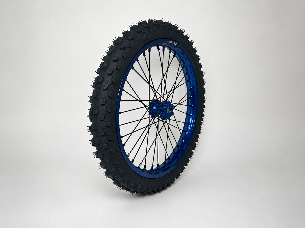 Warp 9 MXE-9 70/100-19 front tire, side view