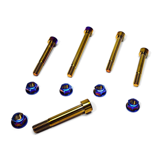 Warp 9 Talaria Sting titanium linkage bolts in gold with burnt blue lock nuts