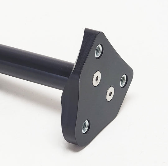 Warp 9 front fender adapter, a black plate with four mounting holes on a Warp 9 stem lock